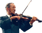 shinichi Suzuki playing violin